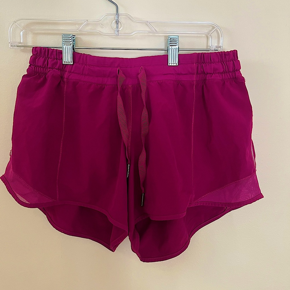 Lululemon hotty hot shorts in magenta pink, size 8 long